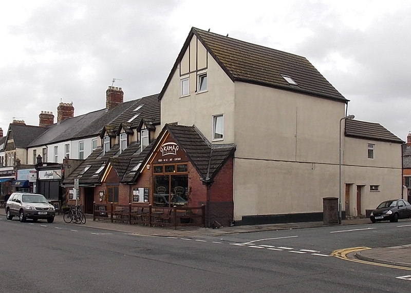 The Kama Lounge on a street corner beside terraced houses in Cathays.