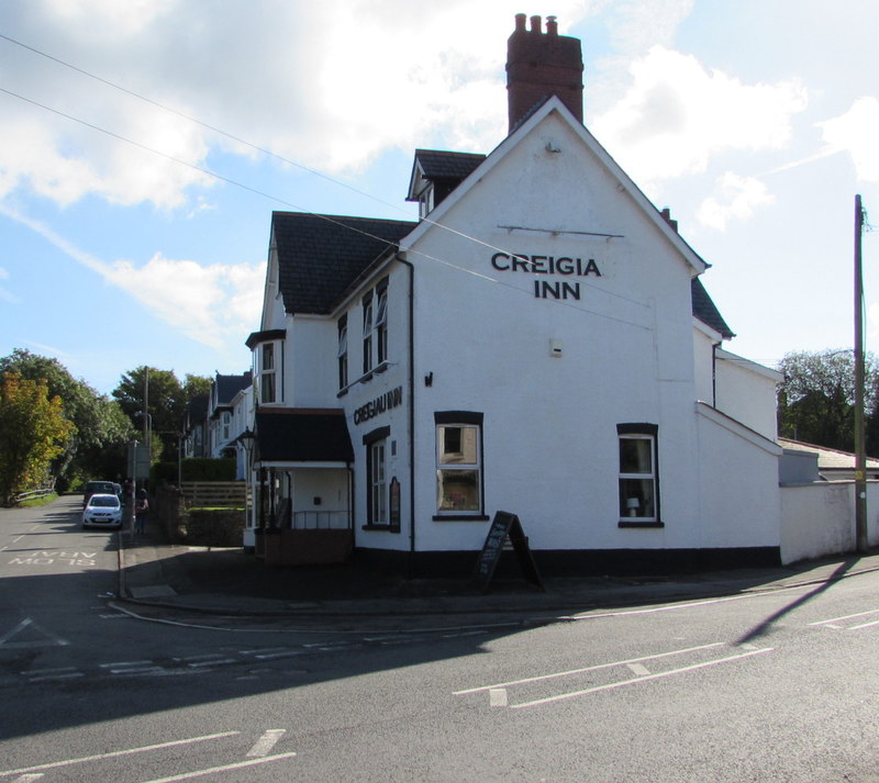 The Creigiau Inn, a white-painted pub on a corner in Creigiau.