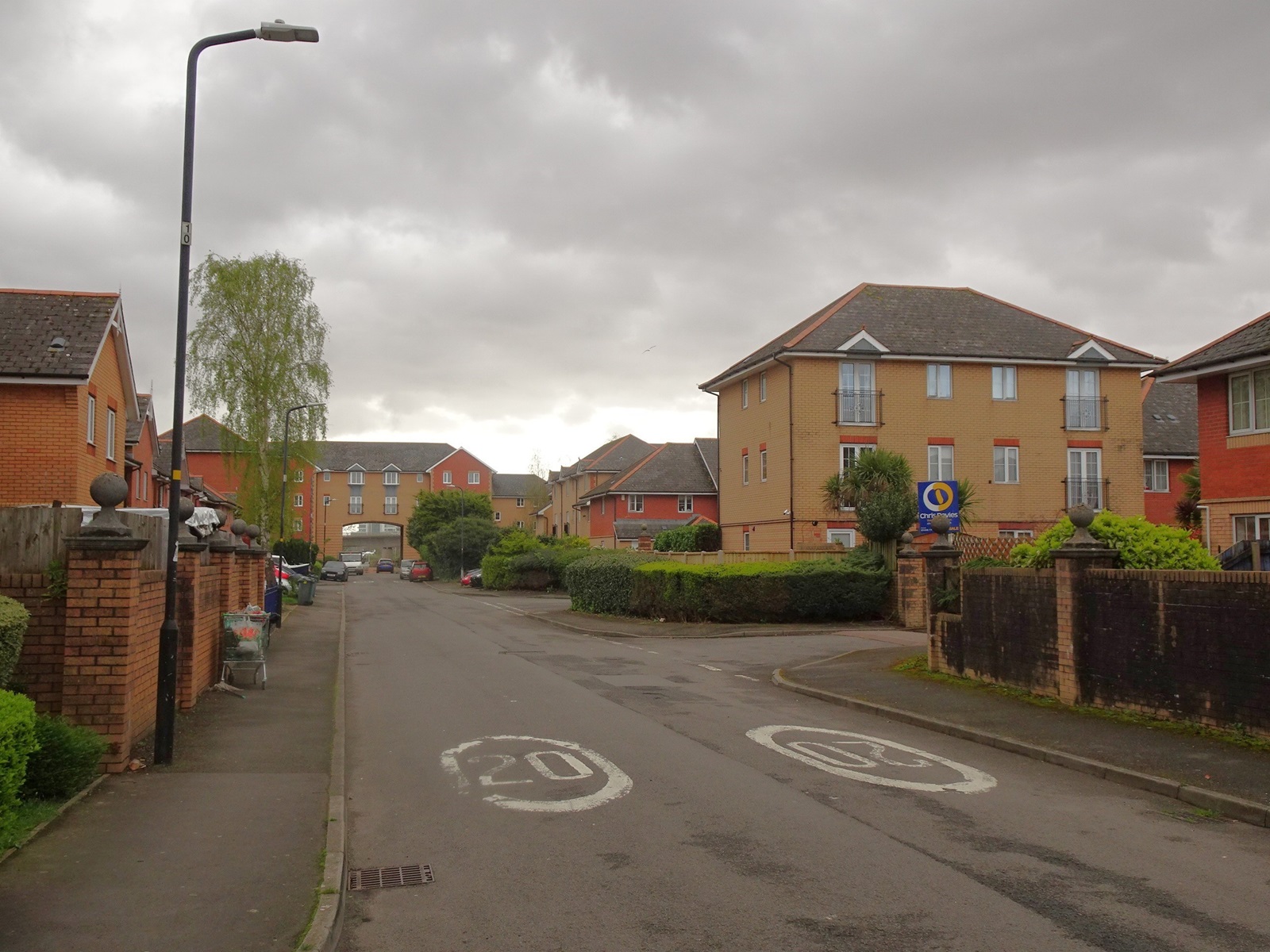 Seager Drive at Windsor Quay, a street of modern brick houses and flats.