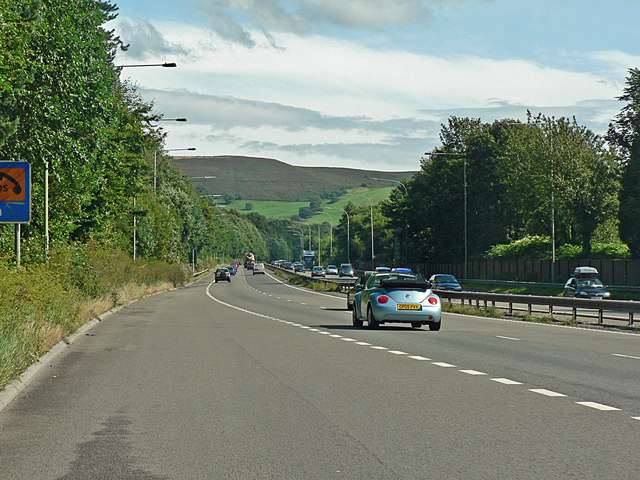 The A470 dual carriageway at Upper Boat, with green hills ahead.